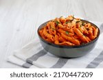 Small photo of Homemade Penne Alla Vodka from Leftover Sauce with Cheese and Parsley, side view.