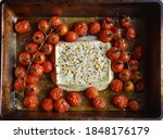 Baked feta pasta, or Tiktok pasta. Feta cheese and tomatoes in chilli and garlic oil. Use chili! In the oven it turns into an amazing pasta sauce by itself. Just add some cooked pasta, mix and enjoy. 