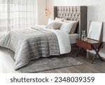 Small photo of luxury bedroom with Silk Throw Gray and comfortable pillows on bed, interior design concept, Boutique Hotel