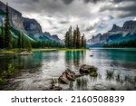 Calm water of a mountain lake. Lake in mountains. Beautiful mountain lake landscape. Mountain lake view