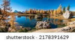 A beautiful lake in the autumn landscape. Autumn lake landscape. Autumn lake panorama. Autumn lake panoramic landscape