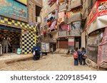 Small photo of Cairo .Egypt - 02.22.2020 - Daily life on the street of Cairo. Scavenger City - Manshiyat Nasir. Cairo. Egypt