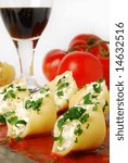 Small photo of Pasta shells stuffed with ricotta, mozzarella and parmesean cheeses