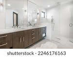 Primary master bathroom with luxury finishing cabinets granite interior room lakehouse
