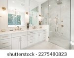 Interior bathroom photography with glass doors subway tile freestanding tub and pedestal sink slate floors granite counter towels claw footed bathtub and view windows 
