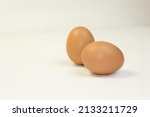 close up photo of chicken eggs | Shutterstock . vector #2133211729