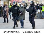 Small photo of Moscow, Russia - 2022.02.27 - police officers detain a woman on Pushkin Square at a rally dedicated to the special military operation in Ukraine