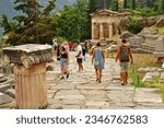Small photo of Delphi; Greece - august 31 2022 : the Athenian Treasury in the archaeological site