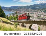 Small photo of Lugano, canton of Ticino, Switzerland. Monte Bre funicular. Public transport cable car with scenic view over the city.