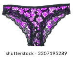 Underwear woman isolated. Close-up of luxurious elegant black lacy thongs panties with colorful pink pattern isolated on a white background. Underwear fashion.