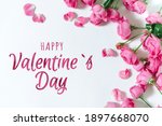 pink roses lying on a white... | Shutterstock . vector #1897668070