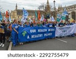 Small photo of WESTMINSTER, LONDON - 22 April 2023: Healthcare workers taking part in Extinction Rebellion Biodiversity March on Earth Day 2023