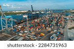 Small photo of Dar es Salaam, Tanzania - April 04: Container terminal port of Dar es Salaam on April 04, 2023 in Dar es Salaam, Tanzania.