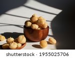Macadamia Nuts In Wooden Bowl...