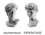 Small photo of Gypsum statue of David's head. Michelangelo's David statue plaster copy isolated on white background. Ancient greek sculpture, statue of hero.
