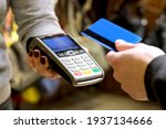 Payment by card, in the payment terminal. Electronic money. Mobile banking. Shopping complex