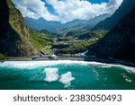 Fantastic aerial view of the coast at São Vicente, Madeira, Portugal, where the mighty waves crash on the black beach, surrounded on high mountains