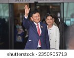 Small photo of BANGKOK, THAILAND August 22, 2023: Thailand's former PM Thaksin Shinawatra, accused of Corruption arrives at Don Mueang International Airport, to fight his own lawsuit. After 17 years in exile abroad.
