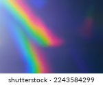 photo of abstract pastel iridescent silver holographic foil background with light leaks. holo color plastic material. cool glitter surface with shiny rainbow feel.