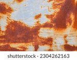 Small photo of Rusted white painted metal wall. Rusty metal background with streaks of rust. Rust stains. The metal surface rusted spots.metal rust texture background.