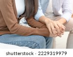 Couple hold hand support each while discussing family issues with psychiatrist. Husband encourages wife suffers depression. psychological, save divorce, Hand in hand together, trust, care, empathy