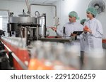 Small photo of A quality supervisor or food or beverages technician discuss about process control of food and drugs before send product to the customer. Production leader recheck ingredient and productivity.