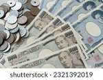 Small photo of Japanese Yen money. close up of the Japanese yen on hand. currency of Japan that is used to change, buy, sell, accumulate, invest, financial, exchange rate, value, accounting, international exchange