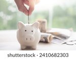 Small photo of Save money. Smart modern woman putting coin into piggy bank for saving. wealth, Finance, business, investment, retirement, future, accounting, plan life, economize, banking, family, health