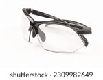 Small photo of Belgrade, Serbia - May 29. 2023.: UVEX SGL 802 VARIO black bicycle glasses isolated above white background with copy space.