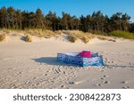 Small photo of Leisure on the beach, windbreak on the beach