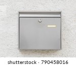 A Silver Mailbox On The Wall