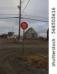Small photo of Multilingual stop sign in English, French and Inuktitut