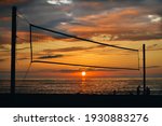 Small photo of Volleyball Net On The Seabeach At Sunset