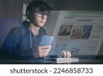 Small photo of Teen reads newspaper online. Reading news and information in Internet. Publication, magazine concept