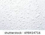 Water droplets on a gray...