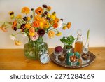 Small photo of Haft Seen traditional table of Nowruz. Persian new year decoration, Table with Haft-seen elements for Novruz, Cultural feast.Traditional celebration of spring in March, Novruz Holiday.