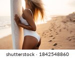 Beautiful surfer woman on the...