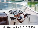 Pleasure boat. White tone. Steering wheel