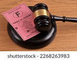 Small photo of Vannes, France, february 25, 2023 : French driving license withdrawal concept with a judge gavel