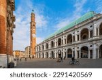 Small photo of Vicenza, Veneto, Italy - March 20, 2023: Piazza dei Signori square with Basilica Palladiana and Torre Bissara clock tower
