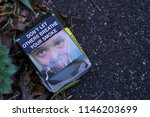 Small photo of Oakleigh, VIC / Australia - July 31 2018: Empty Australian cigarette pack on street with warning don't let others breathe your smoke