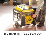 Small photo of Portable gasoline generator.The use of an autonomous energy source. An additional source of energy.