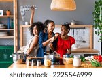 Small photo of Happy beautiful hispanic south american and black women meeting indoors and having fun - Black adult females best friends spending time together, concepts about domestic life, leisure, friendship