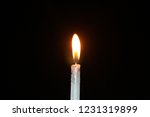Small photo of Candles Burning brightly at Night. White Candle Burning in the Dark with focus on single candle in foreground.Candle burns cleanly and evenly.uneventful candle burnings are a good sign