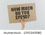 Small photo of The phrase " How much do you spend? " on a banner in men's hand. Human holds a cardboard with an inscription. Money. Savings. Life. Success. Prodigality