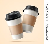 Two Paper Coffee Cups With...