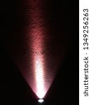 Small photo of Surefire flashlight beam. Neutral tint on the wall