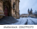 The St. Nicholas Church and the Church of Our Lady before Týn on The Old Town Square (Staroměstské Náměstí) in Prague in early morning in winter.