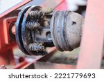 Small photo of PTO Shafts. Closeup Dirty clutch slip or heavy duty power transmission shaft of a rotary mower. Selective focus