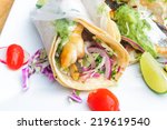 Fish Tacos On White Plate With...